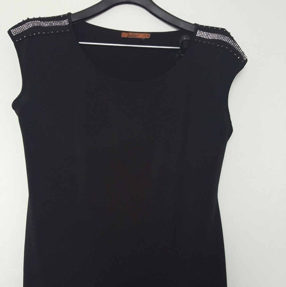 Super cute black top with rhinestone shoulder